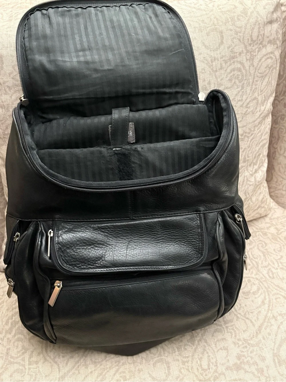 Wilsons Leather Black Leather Backpack with Colorful Floral Scarf
